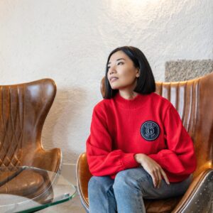 Women's turtleneck sweater with embroidered patch