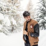 College men's sweatshirt with faux leather sleeves